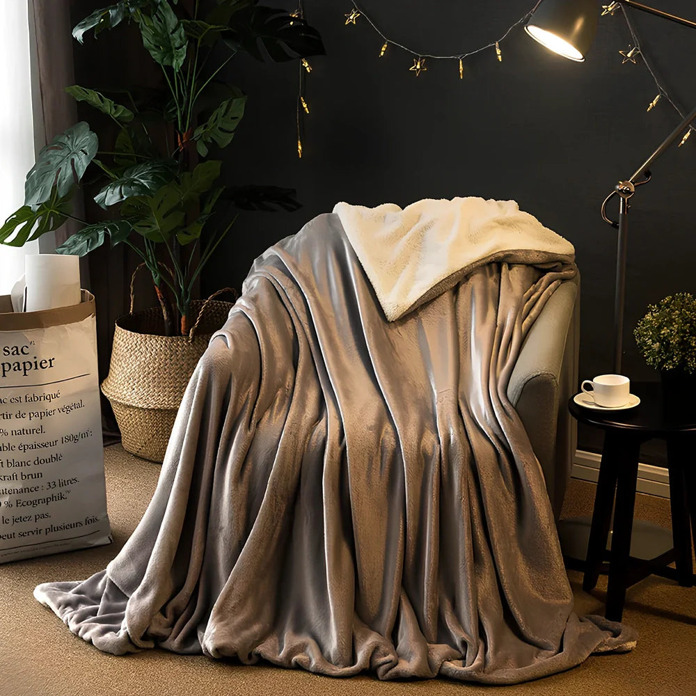 Brown polyester flannel blanket 150x200cm size on sofa, 170g/m² thickened for warmth