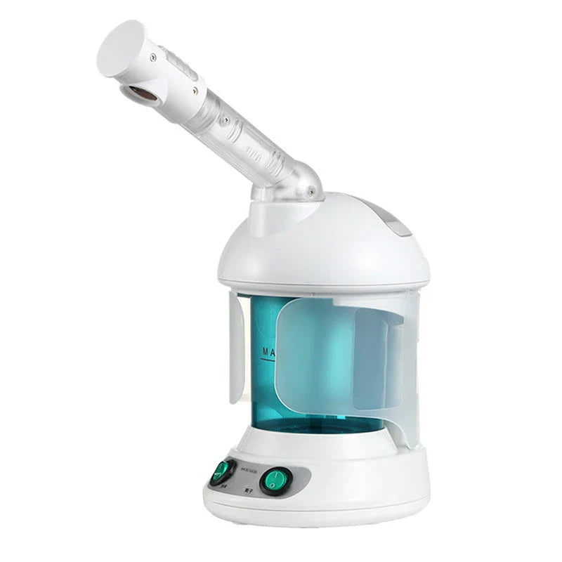 Facial steamer device with rotating nozzle and water tank for spa-like skin rejuvenation at home