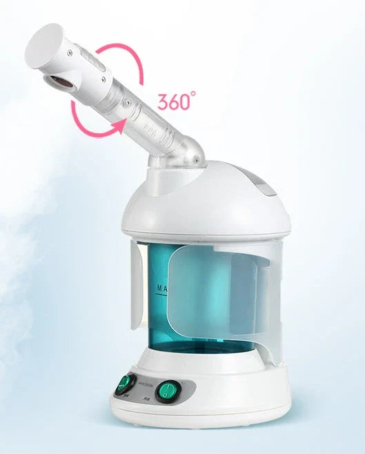 Facial steamer device with rotating nozzle and water tank for spa-like skin rejuvenation at home