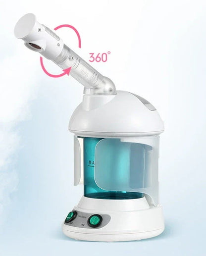 Facial steamer device with rotating nozzle and water tank for spa-like skin rejuvenation at home
