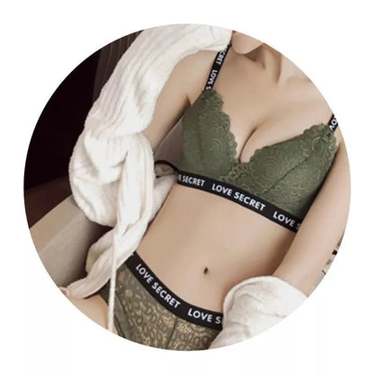 Lace bra and panty set with T-back design in blue, white, black, and green