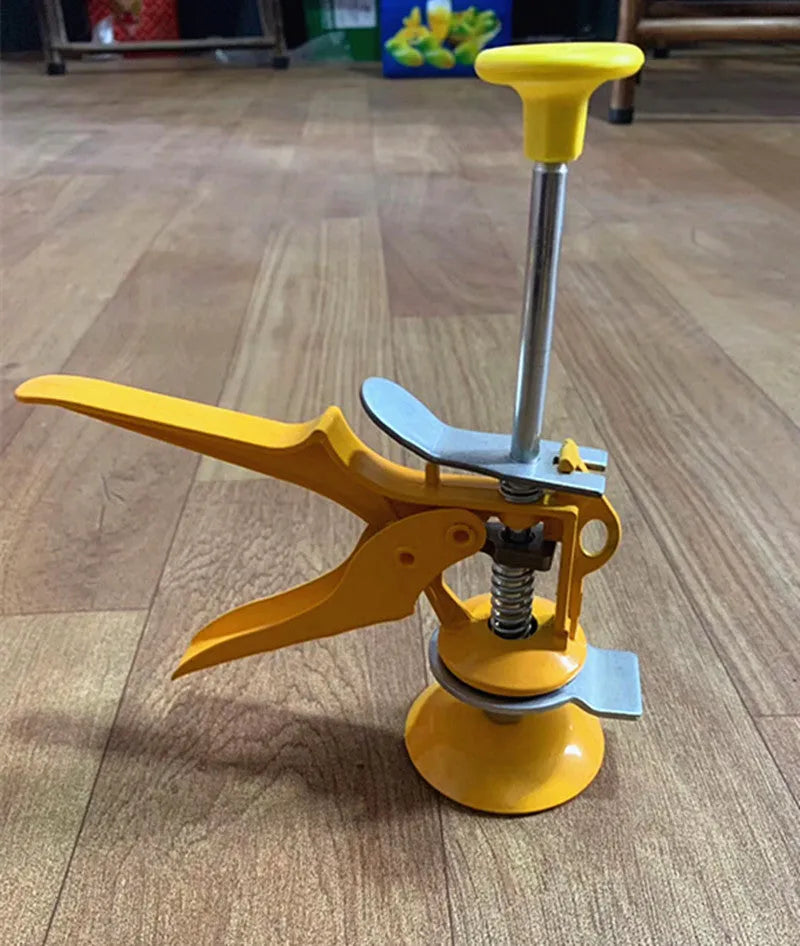 Metal tile raising locator tool with adjustable height mechanism on a work surface.