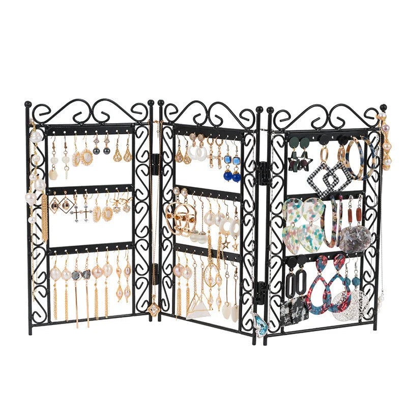 Premium metal jewelry display rack with European-inspired design, foldable for compact storage, and versatile earring and necklace organization.