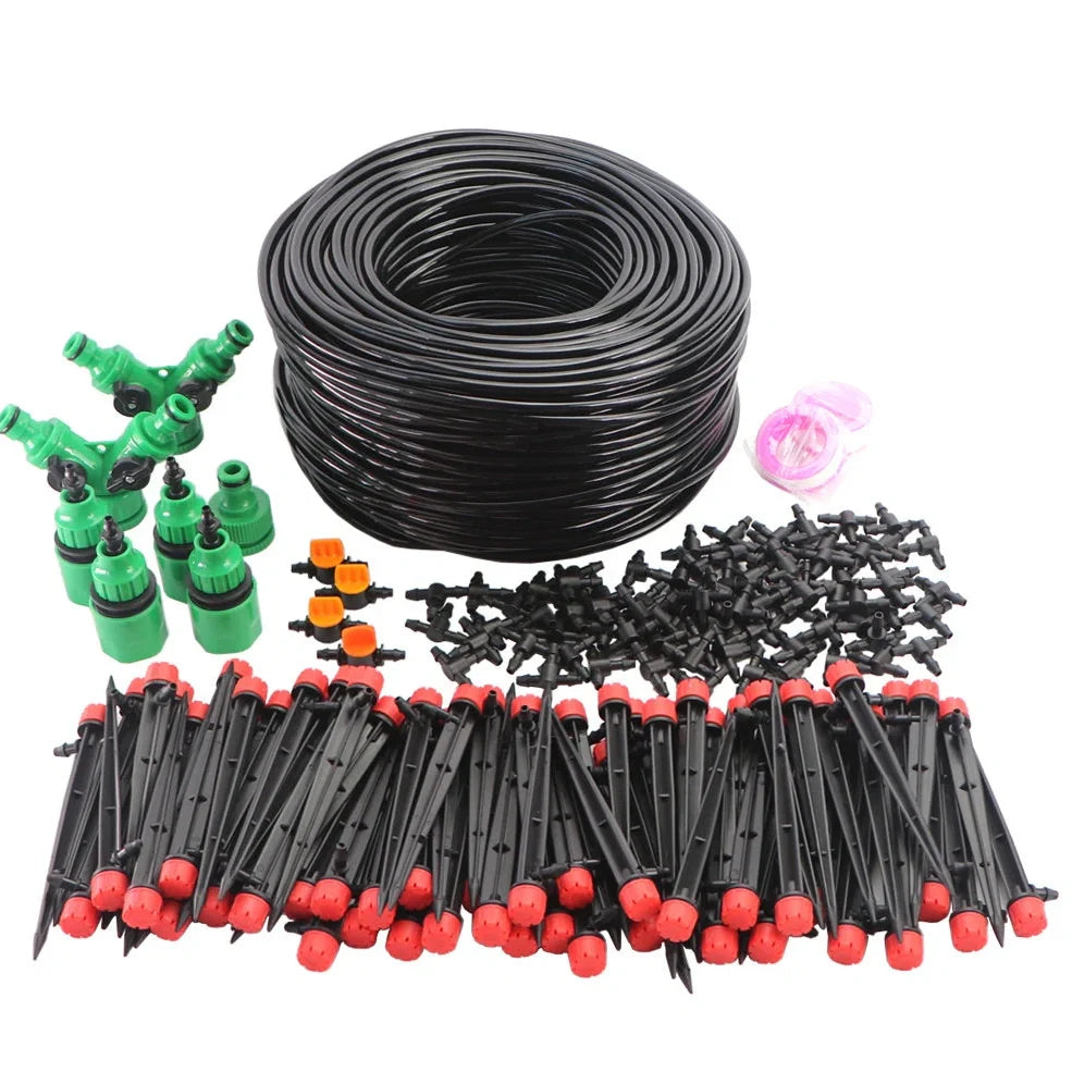 50-metre automatic garden irrigation system kit showing timer, tubing, and spray nozzles arranged for installation