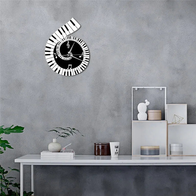 Irregular shaped treble clef piano keyboard musical notes wall clock in black and white colours measuring 69x35x62cm