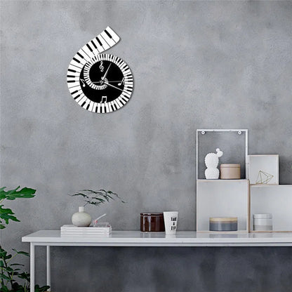Irregular shaped treble clef piano keyboard musical notes wall clock in black and white colours measuring 69x35x62cm