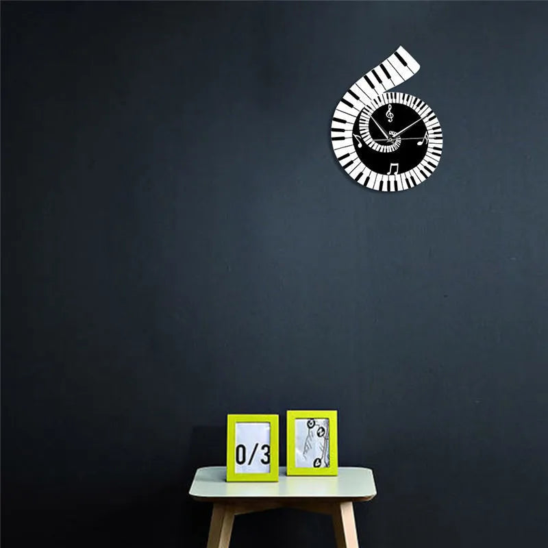 Irregular shaped treble clef piano keyboard musical notes wall clock in black and white colours measuring 69x35x62cm