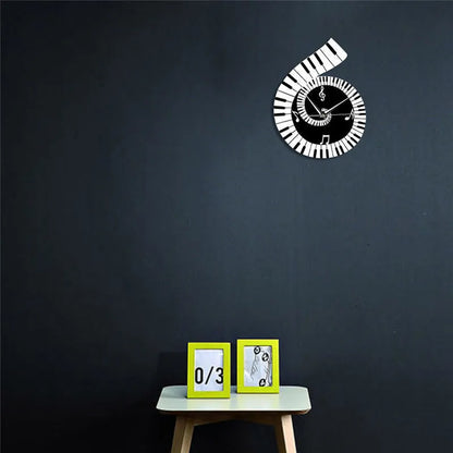 Irregular shaped treble clef piano keyboard musical notes wall clock in black and white colours measuring 69x35x62cm
