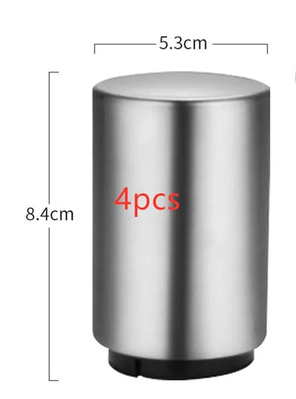 Stainless steel automatic bottle opener measuring 8.4 cm by 5.3 cm on a kitchen counter