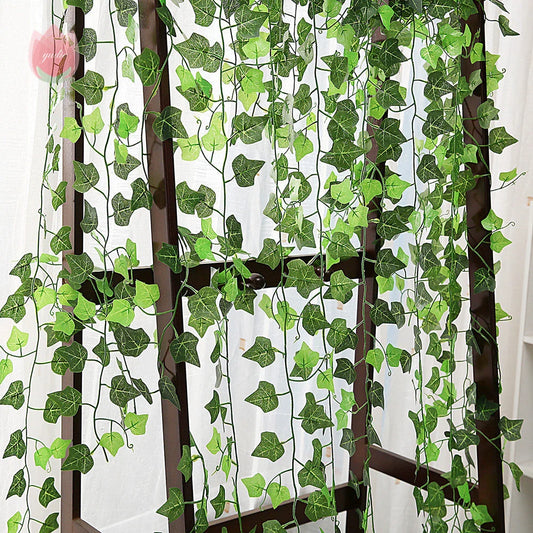 Premium silk hanging leaf garland with realistic green leaves and flexible rattan vine for customizable home, wedding, and garden decor