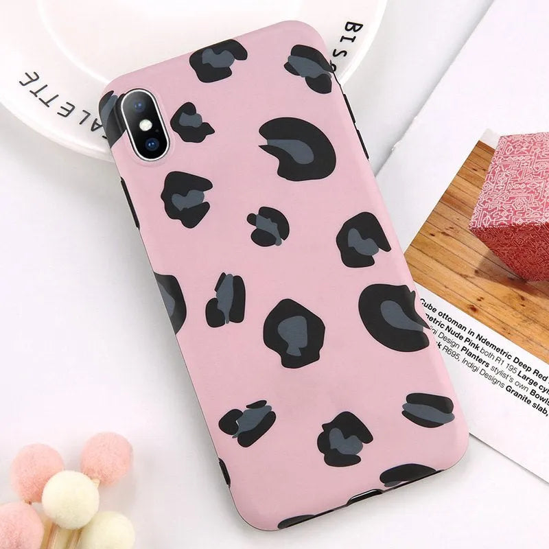 Leopard print protective phone case for iPhone, shown in black, blue, and pink colour options.