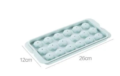 Sky blue and pink 3D round ice moulds creating spherical ice balls for drinks