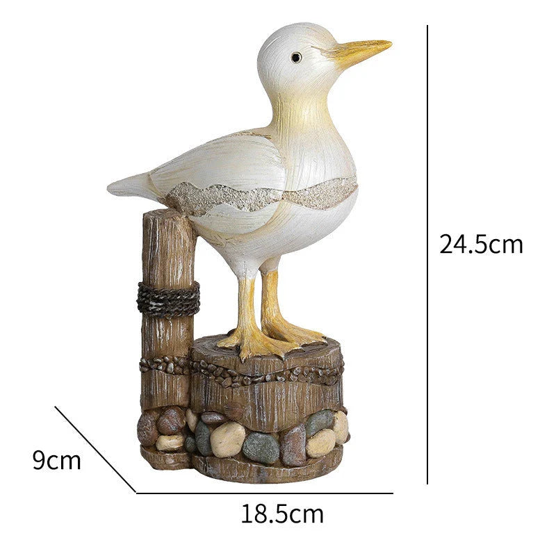 Decorative resin seagull statue with natural colors and textures, perfect for coastal home and office decor