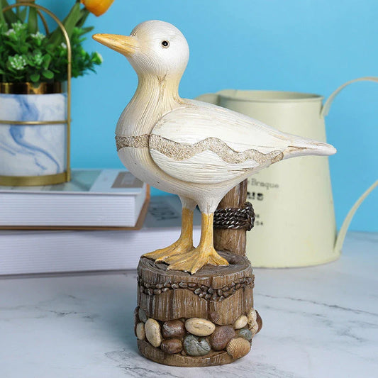 Decorative resin seagull statue with natural colors and textures, perfect for coastal home and office decor