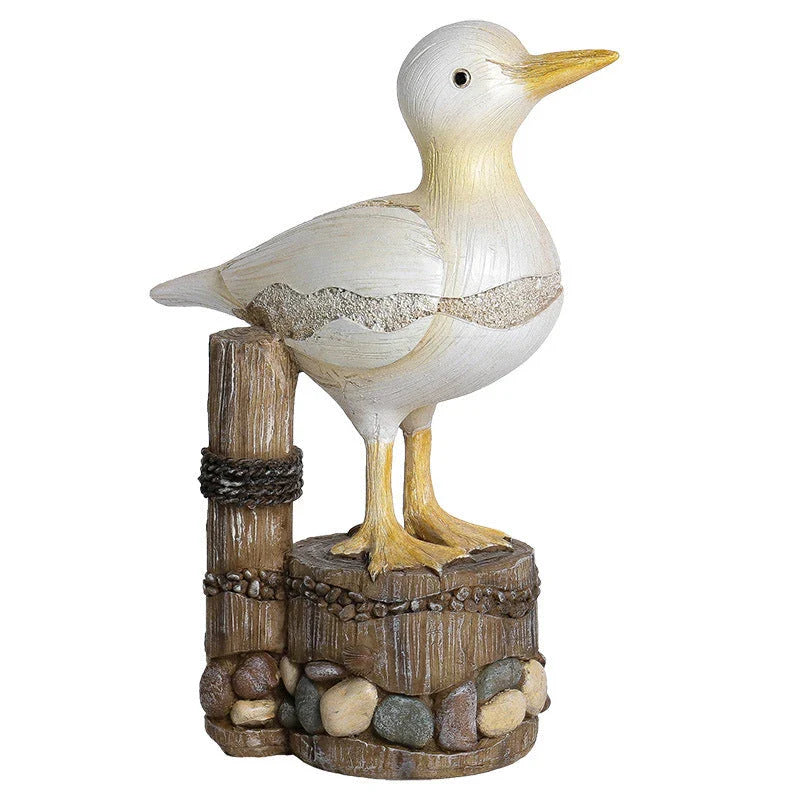Decorative resin seagull statue with natural colors and textures, perfect for coastal home and office decor