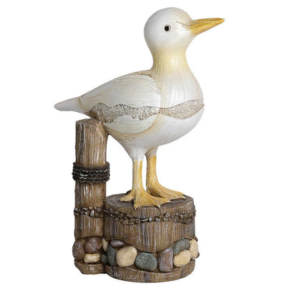 Decorative resin seagull statue with natural colors and textures, perfect for coastal home and office decor