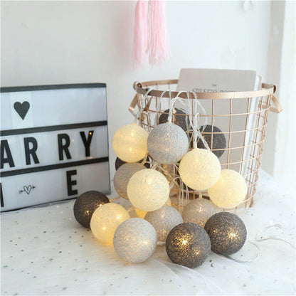 Cosy cotton ball fairy lights with warm, enchanting glow - natural, battery-powered home decor