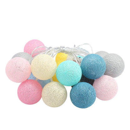 Cosy cotton ball fairy lights with warm, enchanting glow - natural, battery-powered home decor