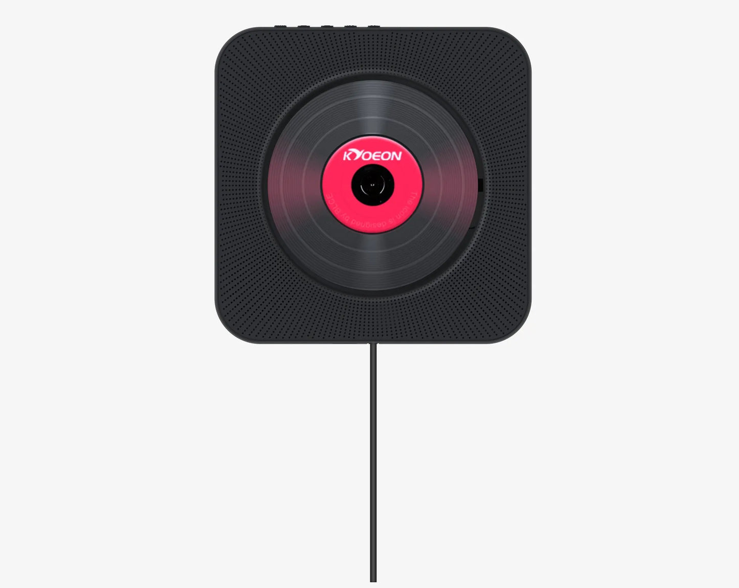 Wall-mounted tray-loading CD player in white colour with remote control on a wooden wall.
