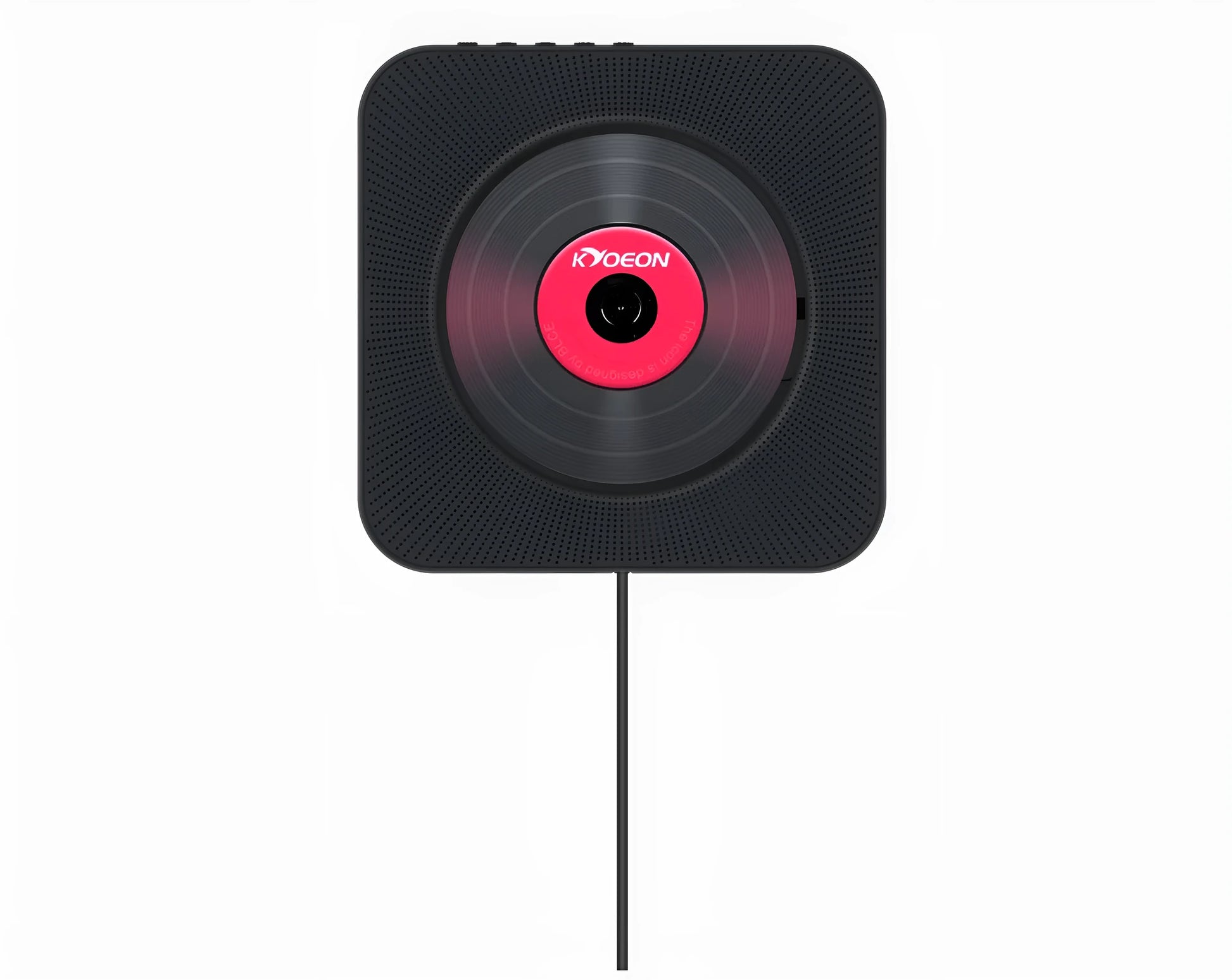 Wall-mounted tray-loading CD player in white colour with remote control on a wooden wall.