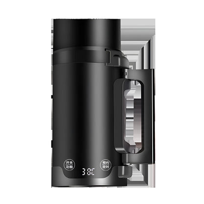 Portable black mini electric kettle with inner water level marking and compact travel design