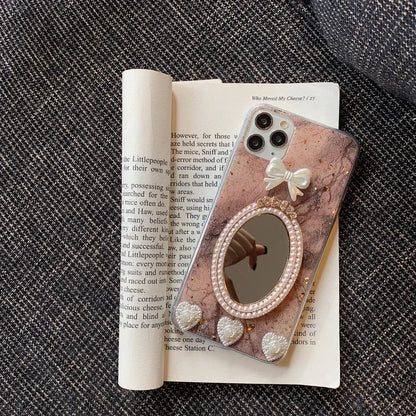 Brown marble bowknot rhinestone mirror silicone case for Apple iPhone on white background