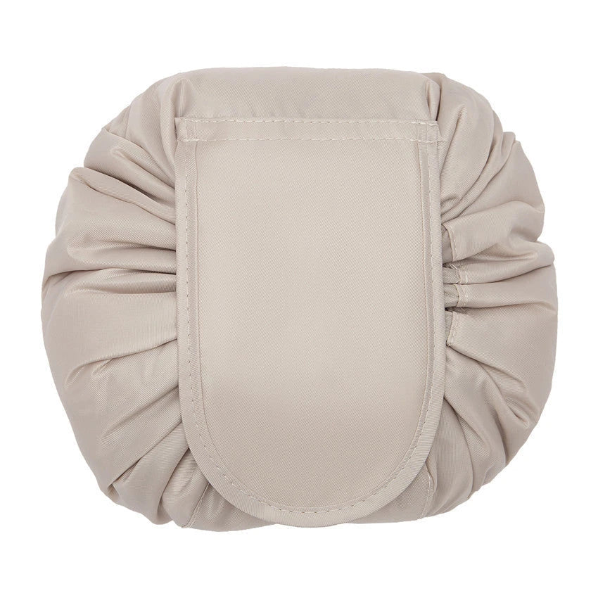 Stylish and roomy makeup travel bag with multiple color options, featuring a spacious interior and drawstring closure for secure storage of beauty essentials.