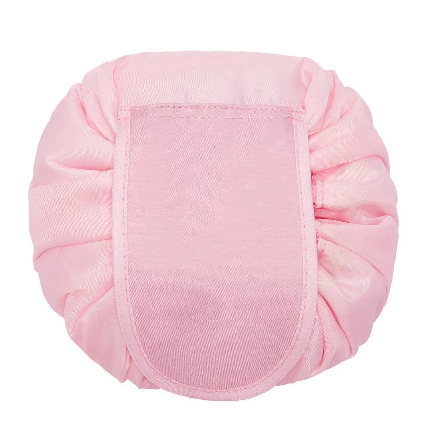 Stylish and roomy makeup travel bag with multiple color options, featuring a spacious interior and drawstring closure for secure storage of beauty essentials.