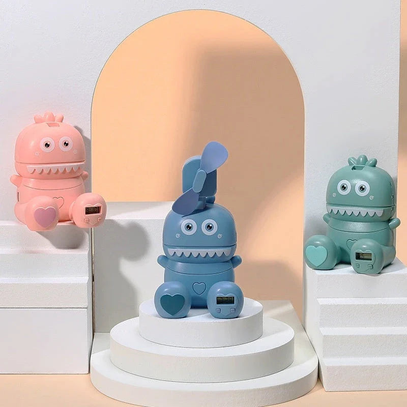 Compact USB-powered mini desktop fan with cartoon design and colorful LED lights for cooling and style
