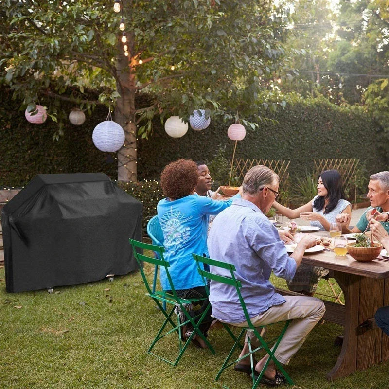 Premium heavy-duty outdoor grill cover made of durable 210D Oxford cloth with water-resistant silver coating and secure locking rope for all-weather protection