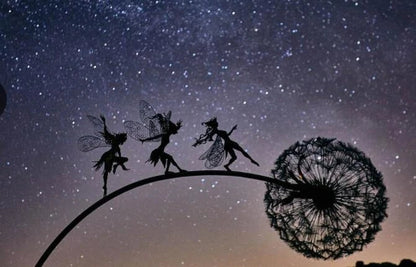 Enchanting fairy garden sculptures made of metal, featuring playful designs of fairies and pixies among dandelions and flowers.