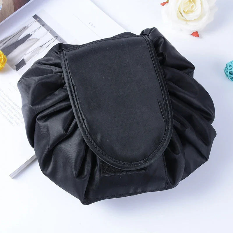 Stylish and roomy makeup travel bag with multiple color options, featuring a spacious interior and drawstring closure for secure storage of beauty essentials.