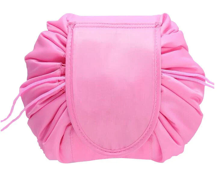 Stylish and roomy makeup travel bag with multiple color options, featuring a spacious interior and drawstring closure for secure storage of beauty essentials.