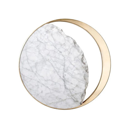 Round white marble and copper wall sconce LED light mounted on a wall
