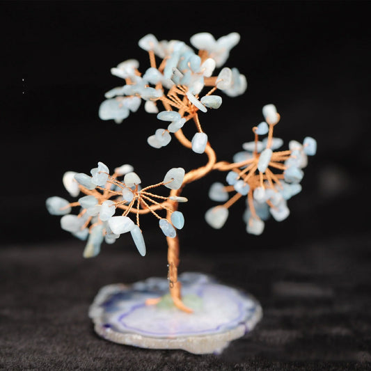 Aquamarine Crystal Fortune Tree Ornament with light blue hue and plant modelling