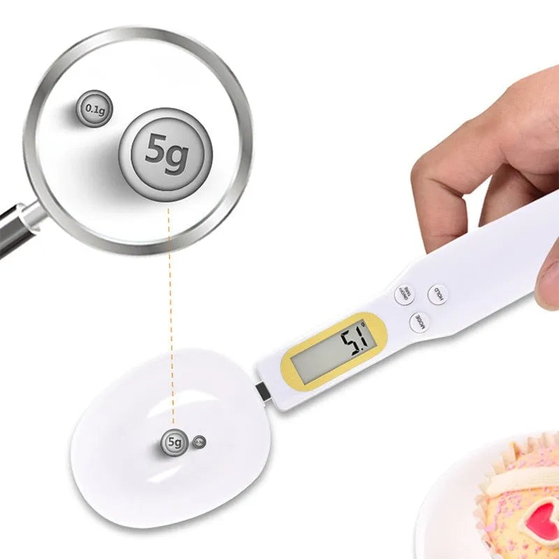 Black digital measuring spoon scale showing LCD display with weight reading
