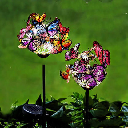Elegant solar-powered butterfly garden lights with sleek black and transparent design, creating a captivating display in an outdoor setting