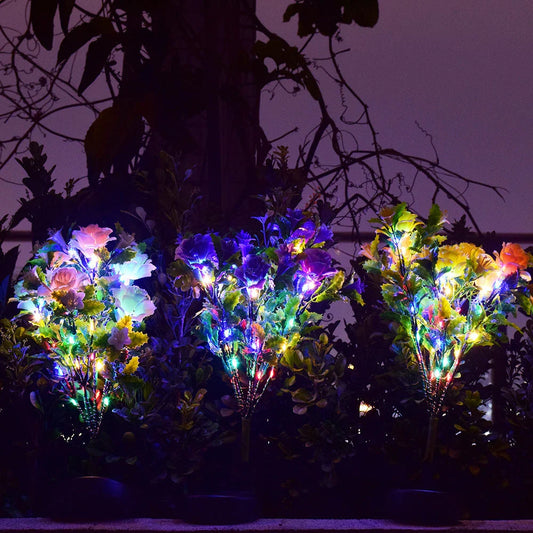 Solar-powered LED garden lights with a decorative flower design for outdoor landscape lighting