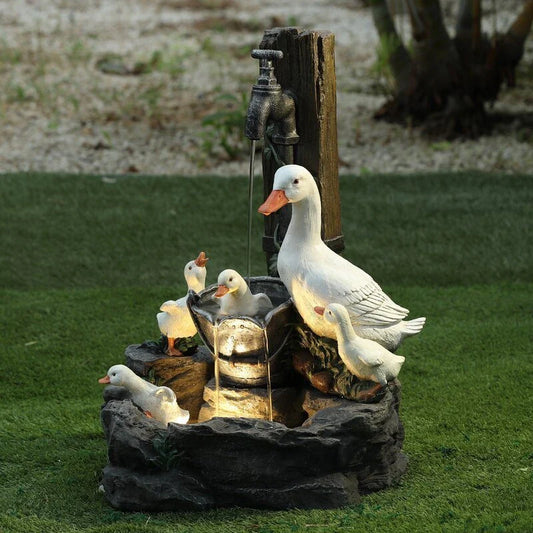 Handcrafted resin duck family garden statue ornament with rustic, natural design for outdoor and indoor home decor