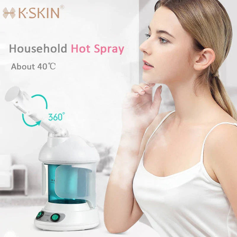 Facial steamer device with rotating nozzle and water tank for spa-like skin rejuvenation at home
