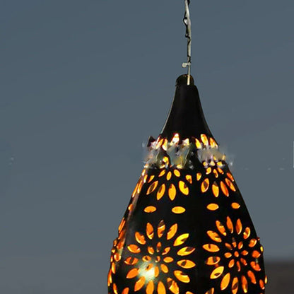 Elegant solar-powered garden lantern with a drop-shaped metal design and a soft, flower-patterned glow