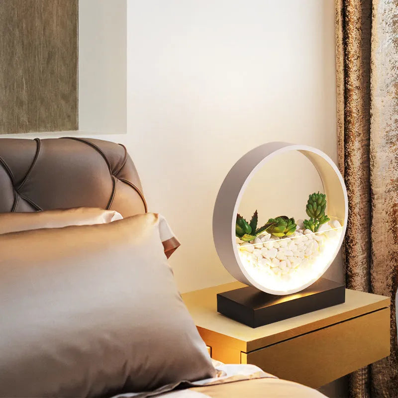 Black metal bedside table lamp with creative succulent design elements and push button switch