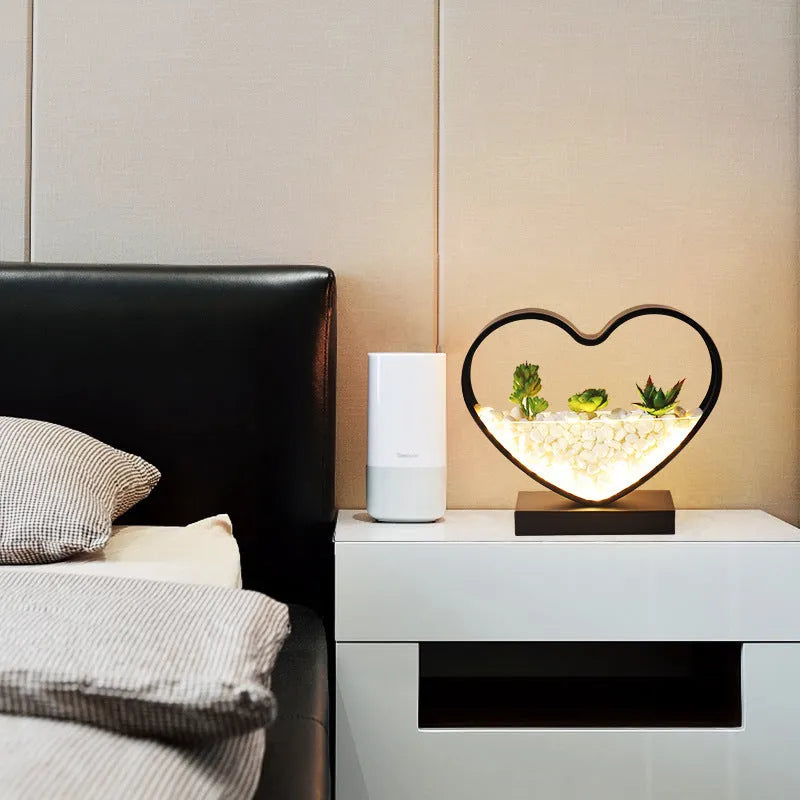 Black metal bedside table lamp with creative succulent design elements and push button switch
