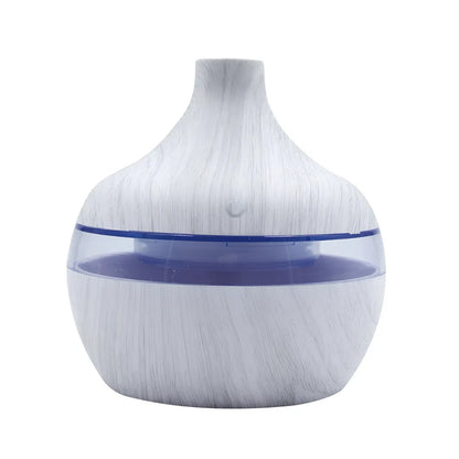 Compact wood grain USB humidifier with 300ml capacity, yellow wood-grain finish, LED lights, for aromatherapy misting