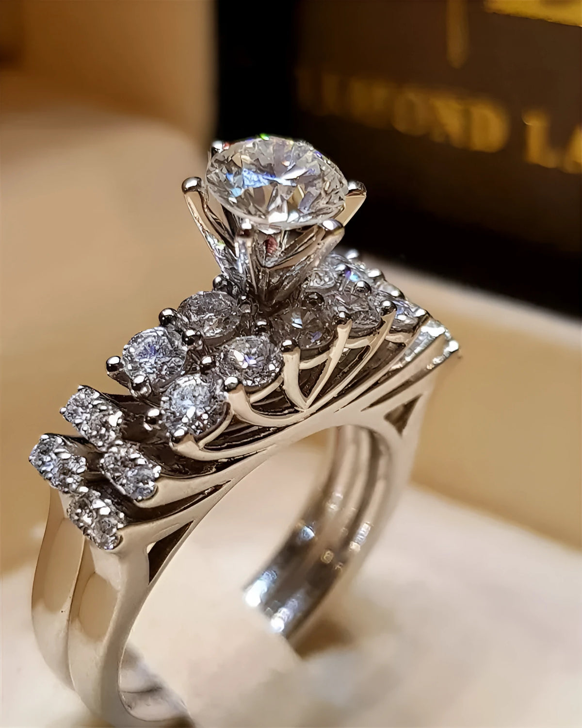 Crown engagement ring in alloy with electroplated finish, available in sizes 5 to 12 and styles A to G