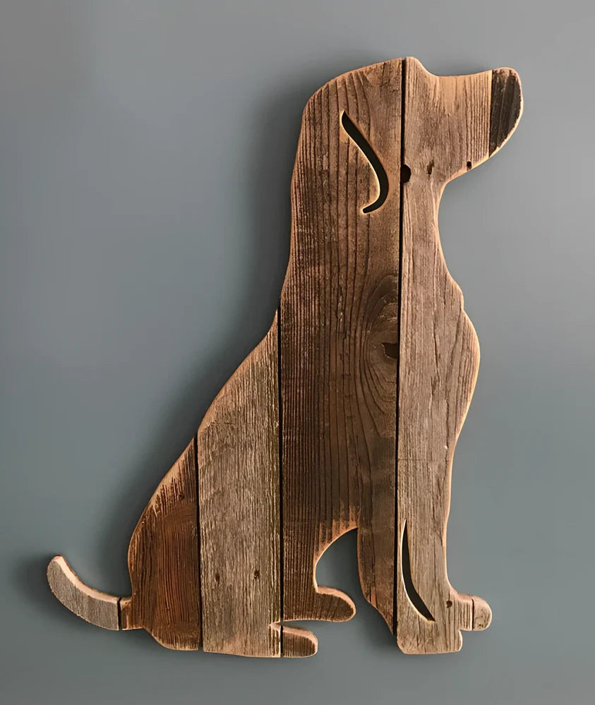 Handcrafted wooden dog breed decorations showing manual carving details