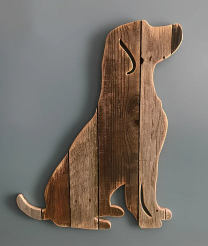 Handcrafted wooden dog breed decorations showing manual carving details