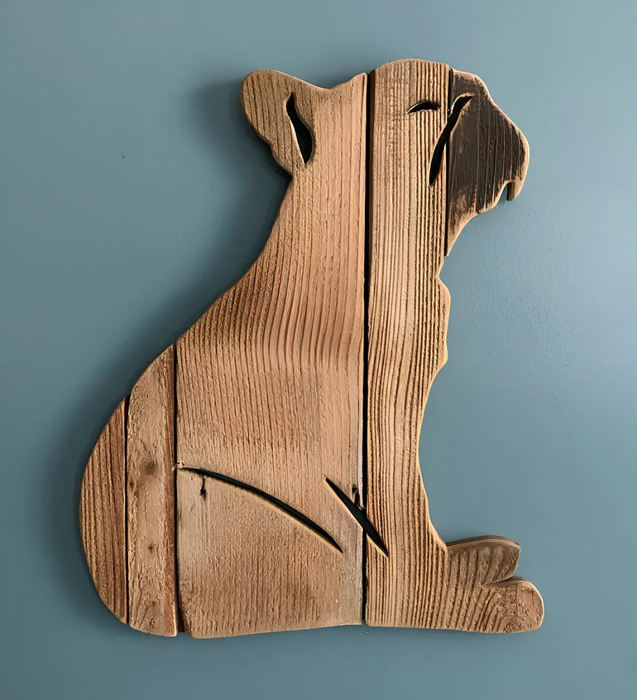 Handcrafted wooden dog breed decorations showing manual carving details