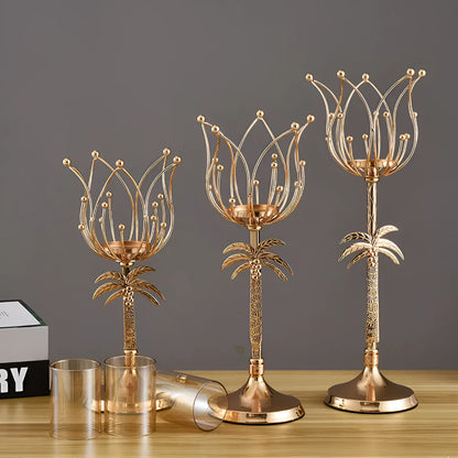 Iron candle holder in gold or silver finish on a dining table.