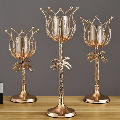 Iron candle holder in gold or silver finish on a dining table.